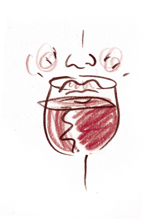 Eine Nase riecht an einem Weinglas riecht