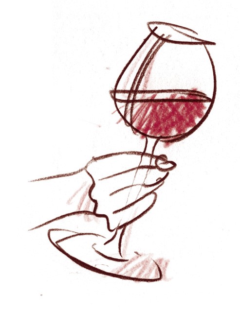 Ein Weinglas wird geschwenkt
